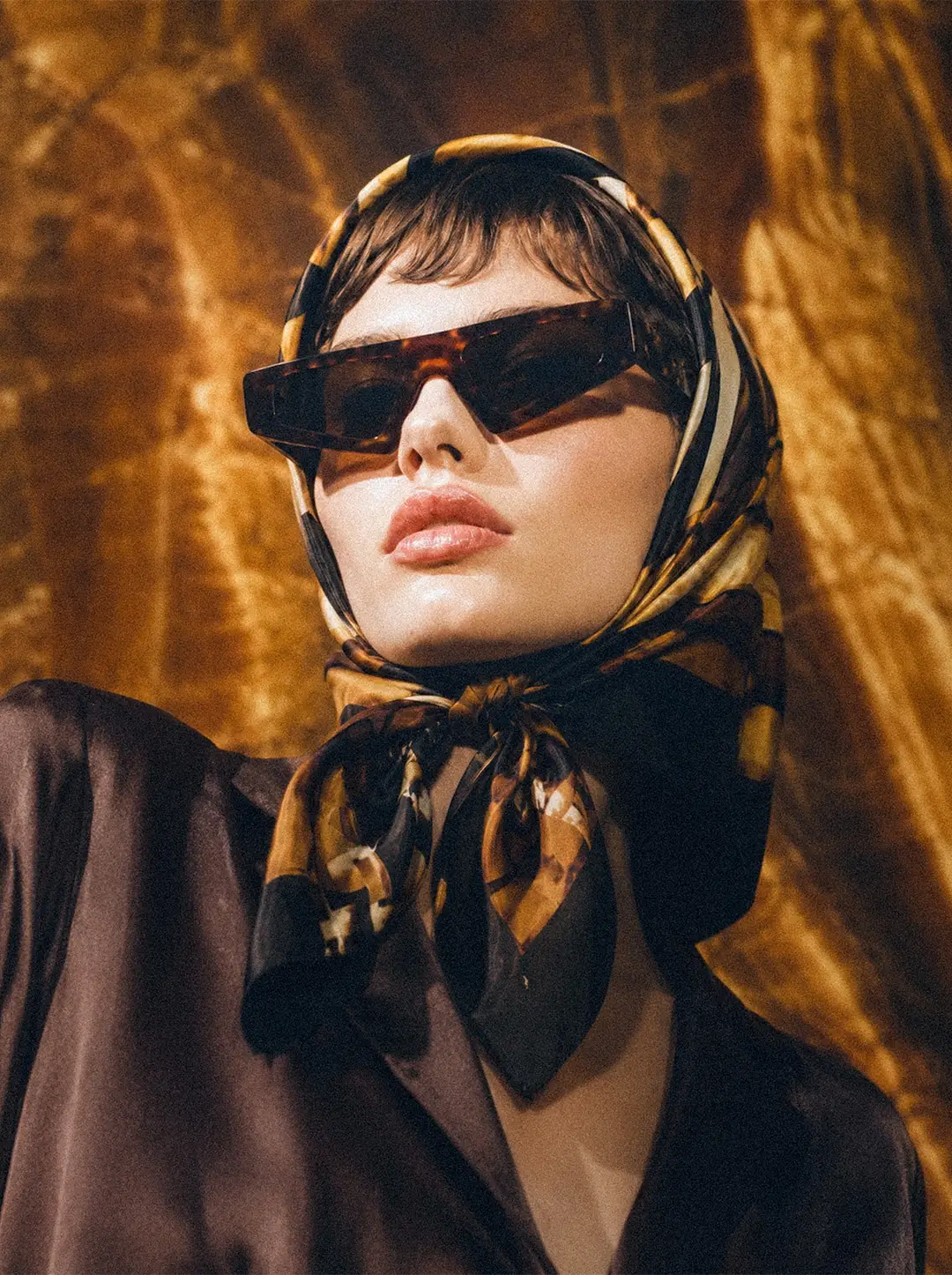 AI fashion campaign visual: hero beauty portrait in angular tortoiseshell sunglasses